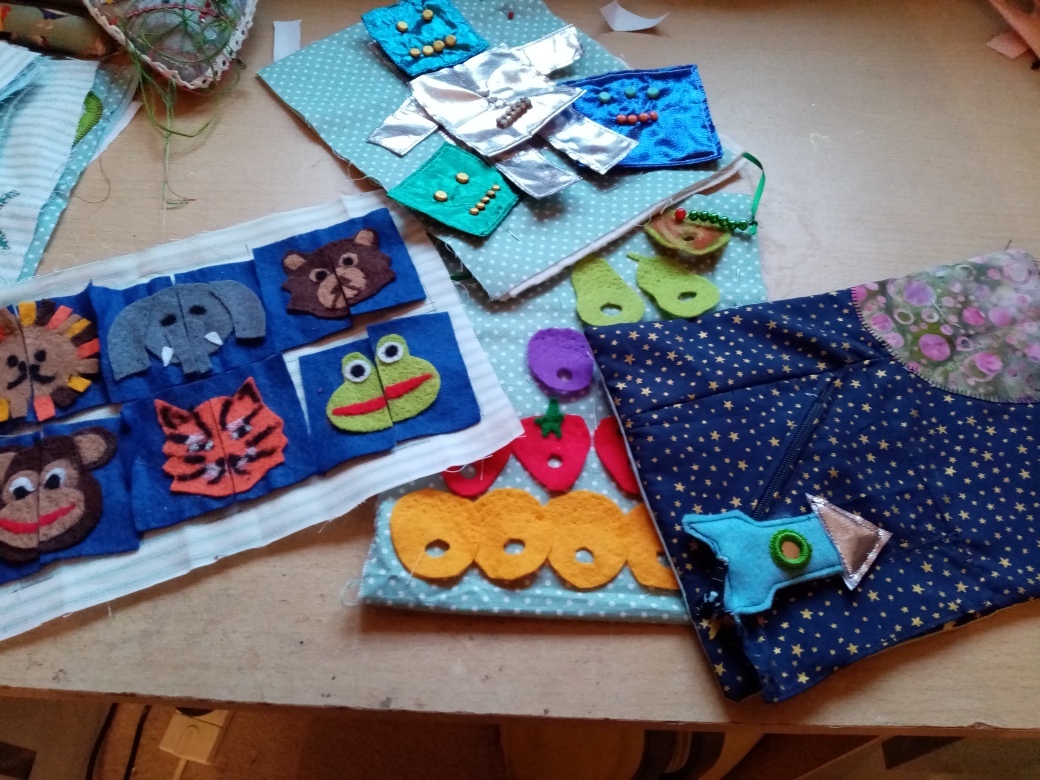 This is the third “busy book” Evelyn has made, one for each of her grandson’s.  They are full of exciting, colourful and unique pages that will hopefully keep Drew busy for hours.